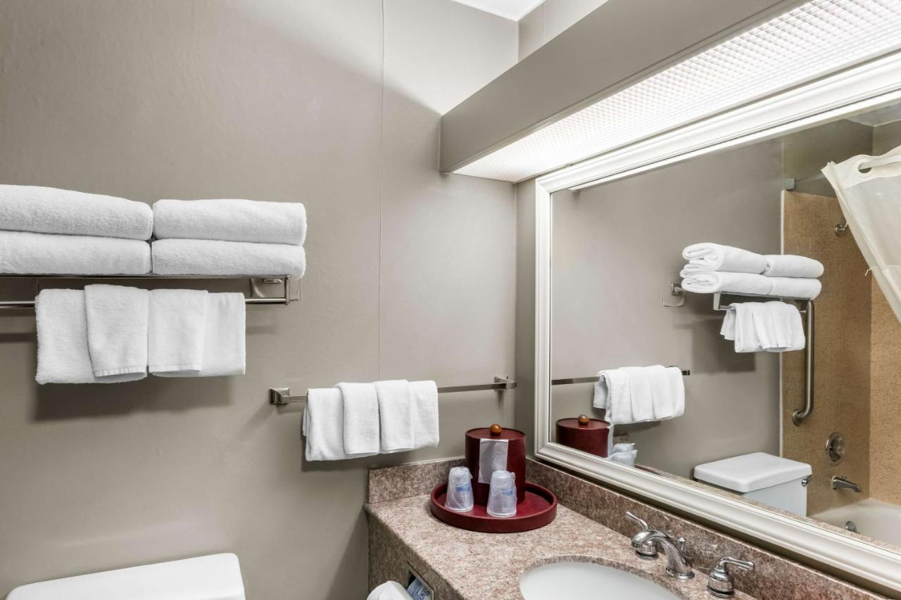 Queen Room with Three Queen Beds at SureStay Hotel by Best Western SeaTac Airport North