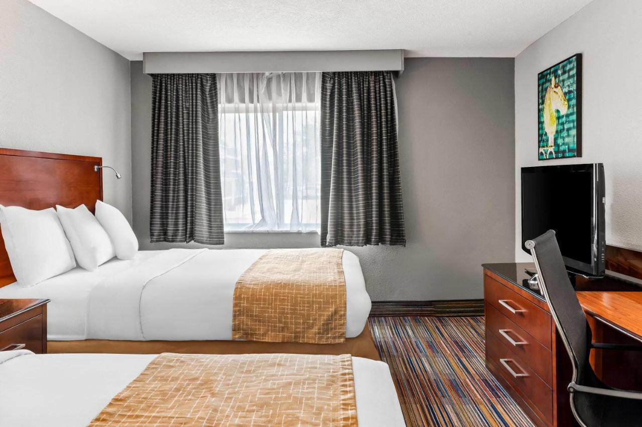 Queen Room with Two Queen Beds - Non-Smoking at Travelodge by Wyndham Bloomington
