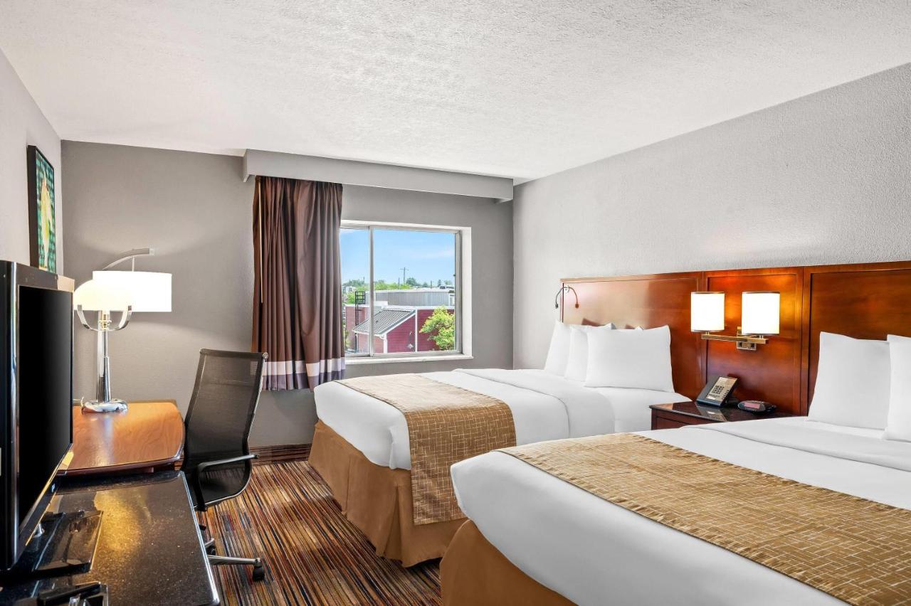 Queen Room with Two Queen Beds - Non-Smoking at Travelodge by Wyndham Bloomington