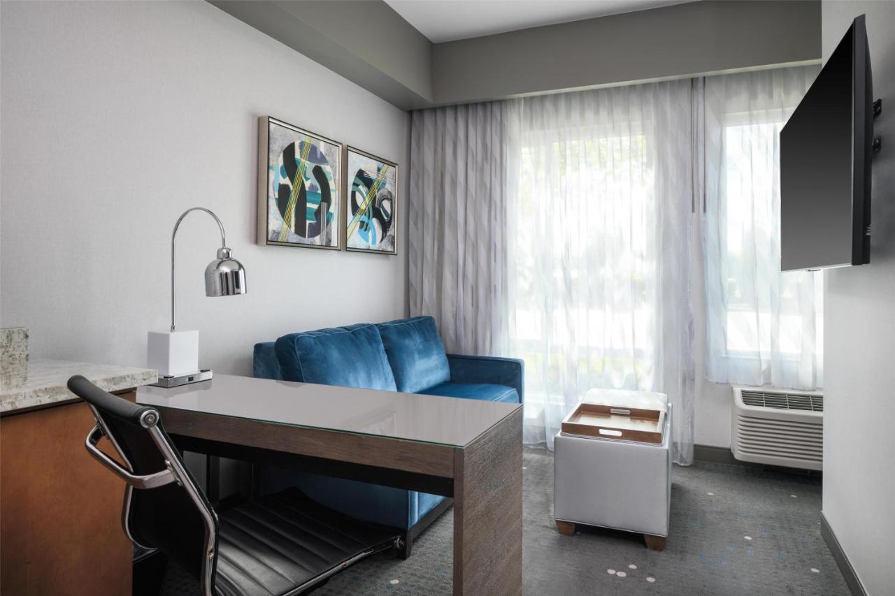 King Suite with Sofa Bed and Roll-In Shower - Mobility Access at Best Western Premier Hotel at Fisher's Landing