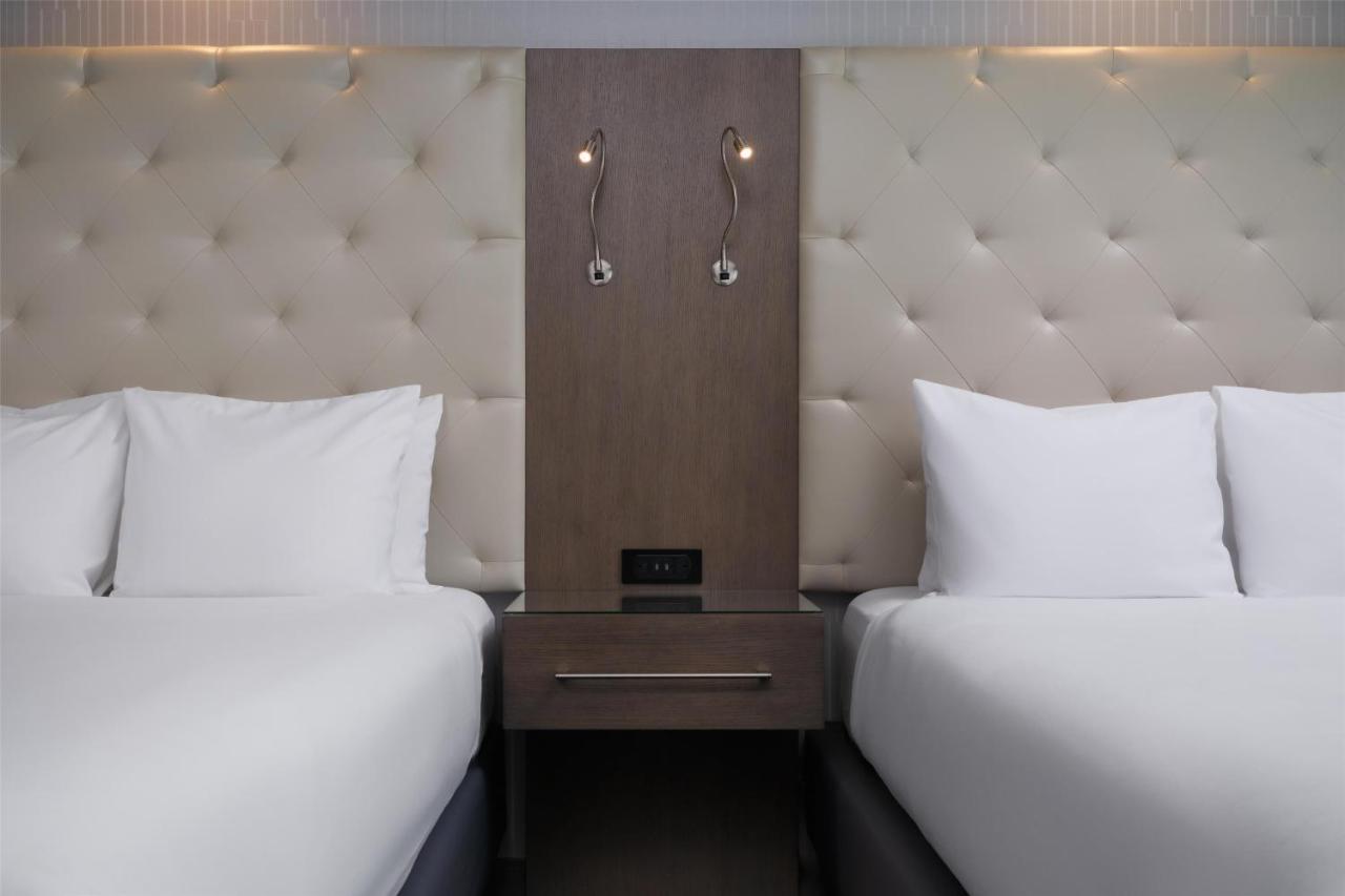 Queen Room with Two Queen Beds - Communication Assistance at Best Western Premier Hotel at Fisher's Landing