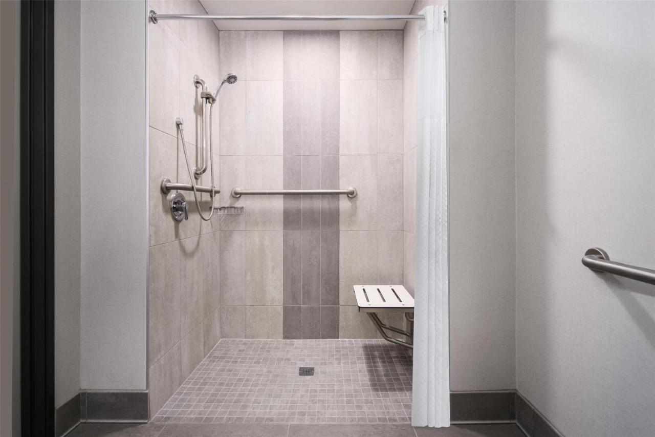 King Room with Sofa Bed and Roll-In Shower - Mobility Access at Best Western Premier Hotel at Fisher's Landing