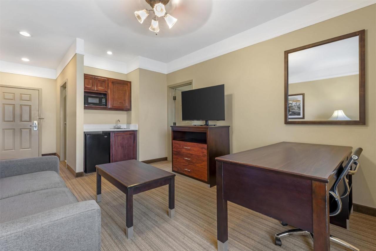 King Suite with Sofa Bed and Mobility Accessible Walk in Shower at Best Western Plus Monica Royale Inn & Suites