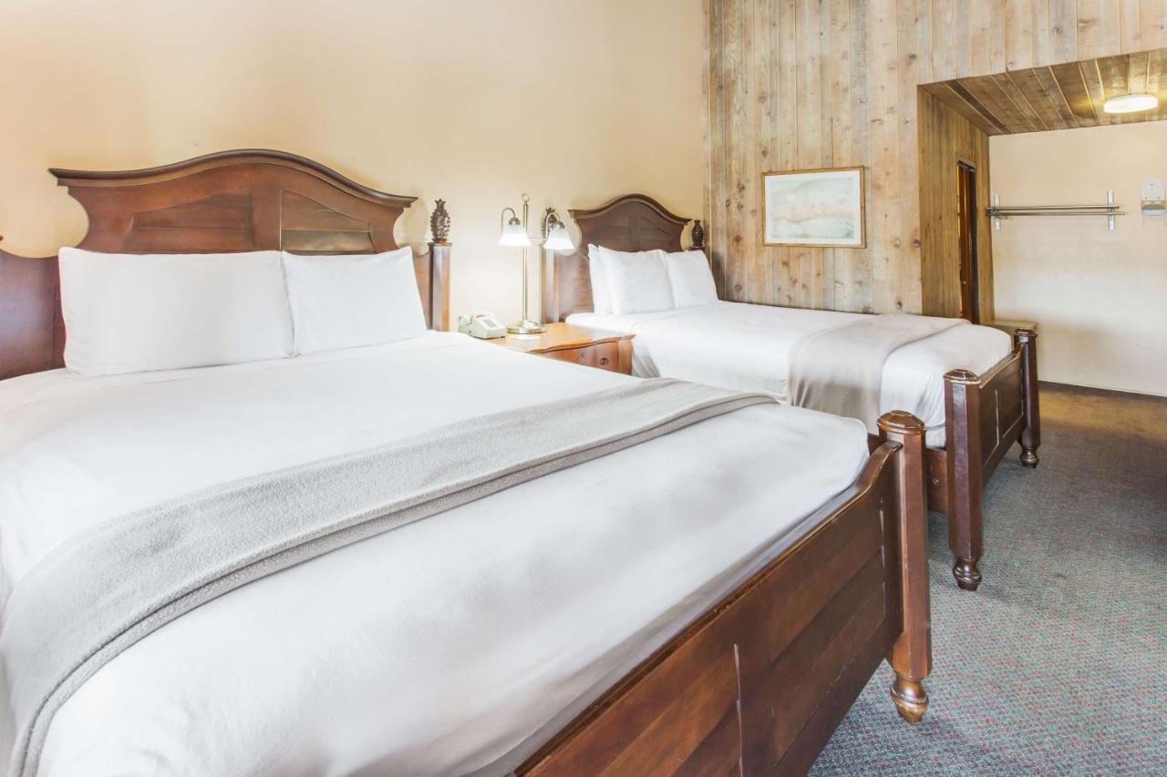 Queen Room with Two Queen Beds - Non-Smoking at Days Inn by Wyndham West Allis/Milwaukee