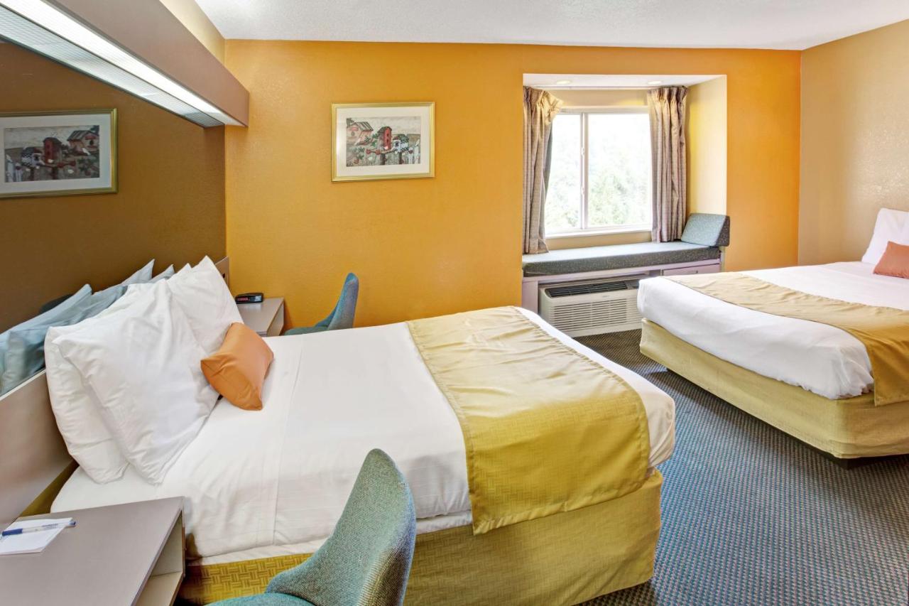 Queen Room with Two Queen Beds - Non-Smoking at Microtel Inn & Suites by Wyndham Gatlinburg