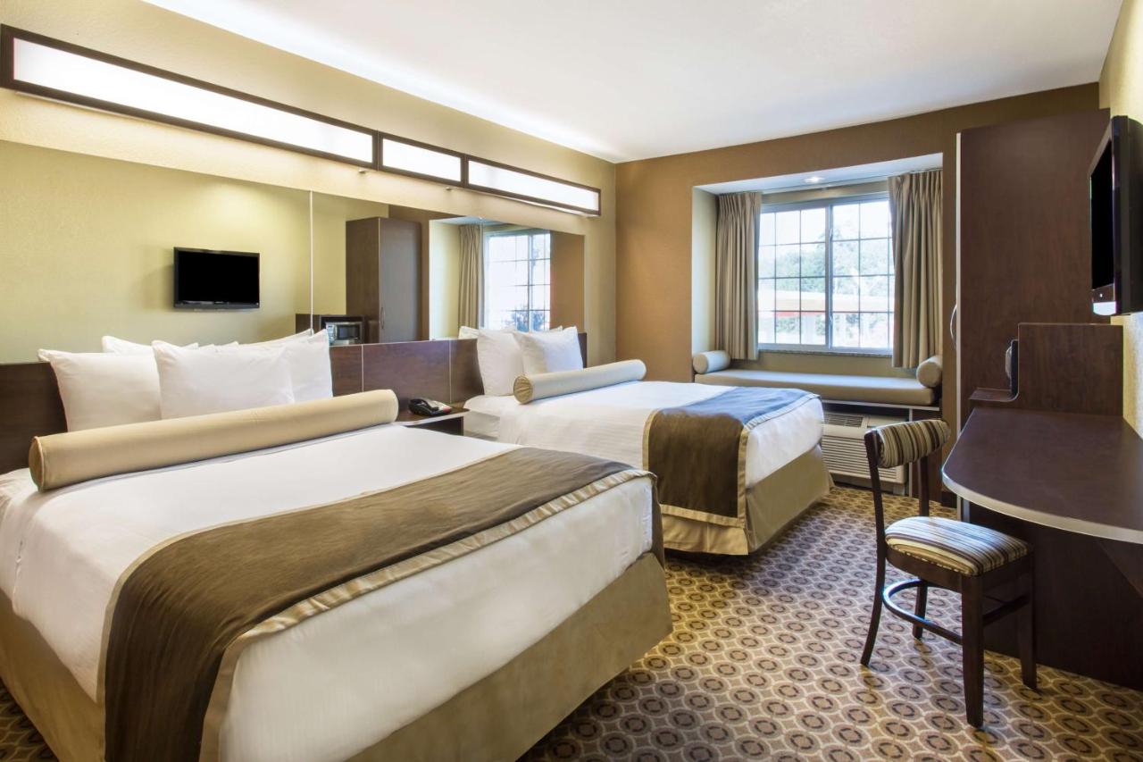 Queen Room with Two Queen Beds - Non-Smoking at Microtel Inn & Suites by Wyndham Pearl River/Slidell