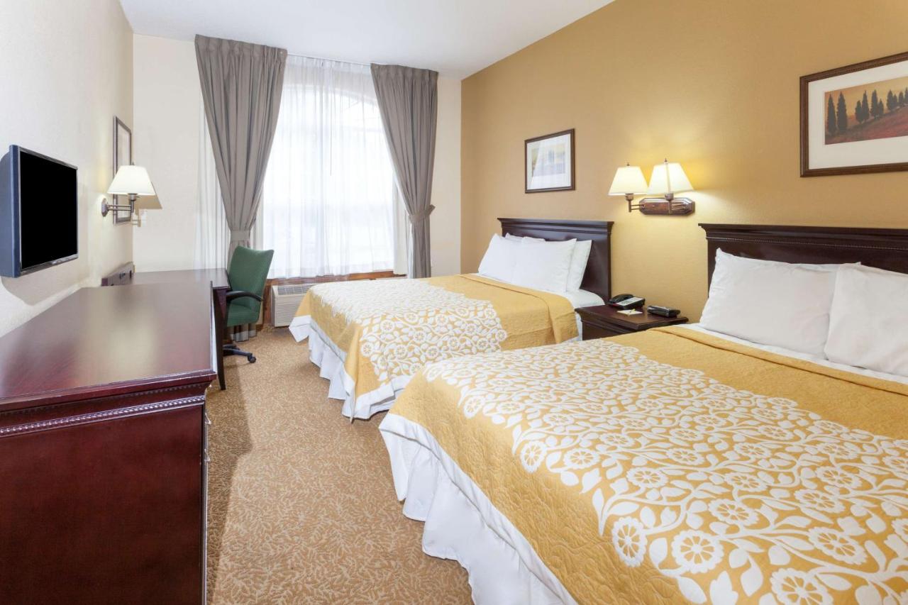 Queen Room with Two Queen Beds - Non-Smoking at Days Inn & Suites by Wyndham Tucker/Northlake