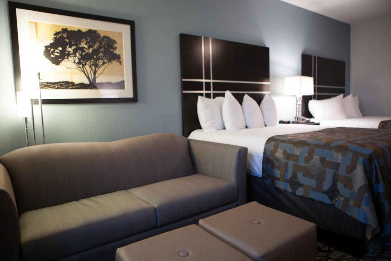 Queen Room with Two Queen Beds and Sofa Bed - Non-Smoking at La Quinta Inn & Suites by Wyndham Lubbock Southwest