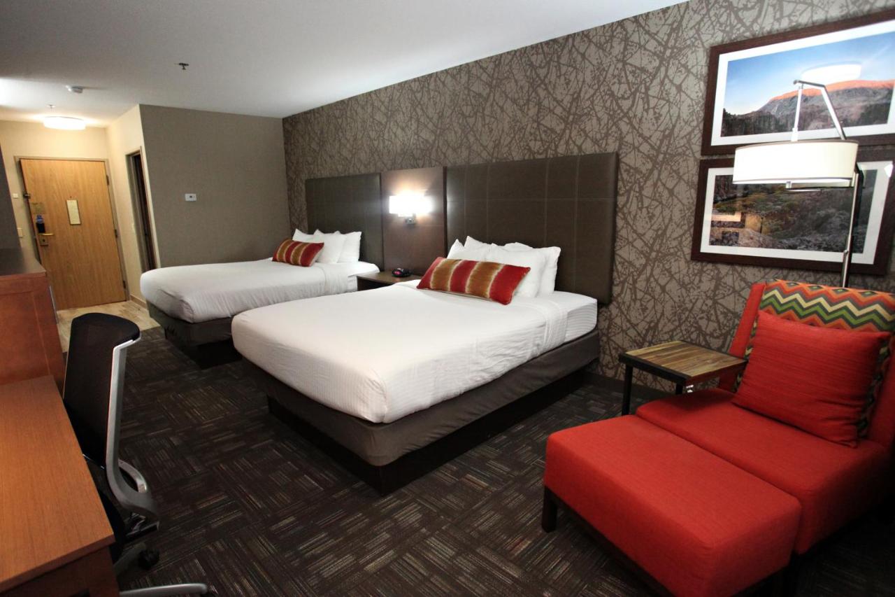 Queen Suite with Two Queen Beds and Sofa Bed at Best Western Plus Cottontree Inn