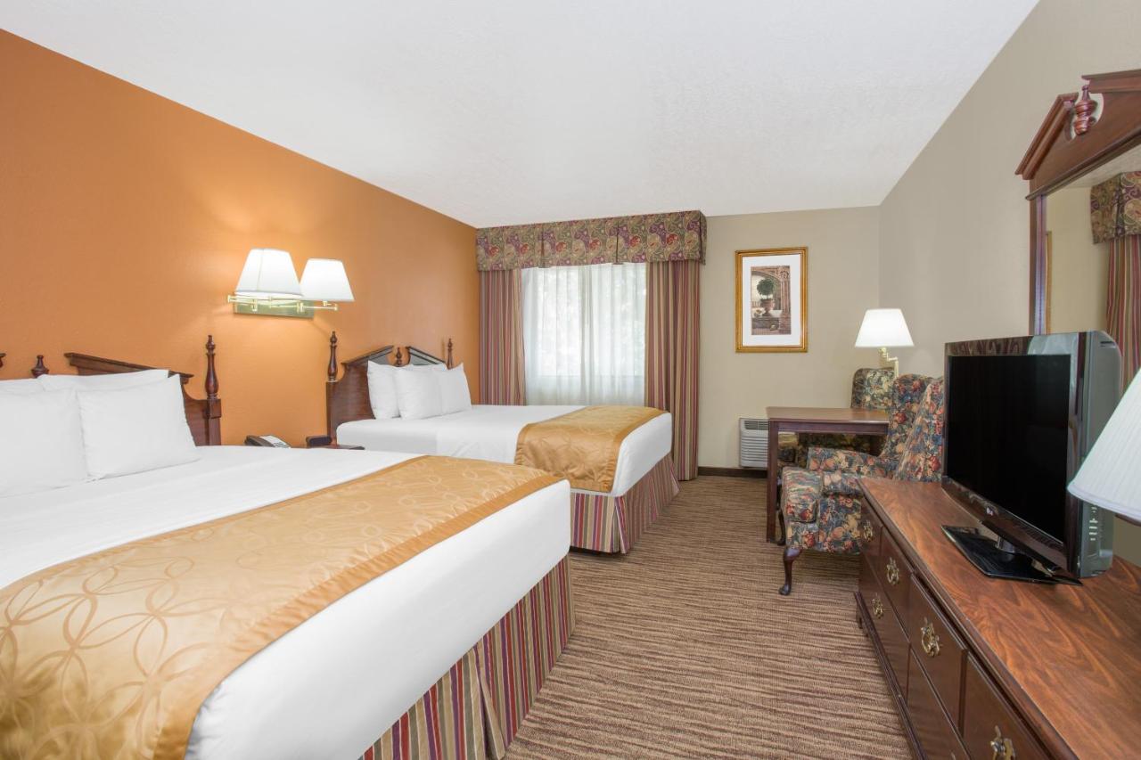 Queen Room with Two Queen Beds - Smoking at Days Inn & Suites by Wyndham Red Rock-Gallup