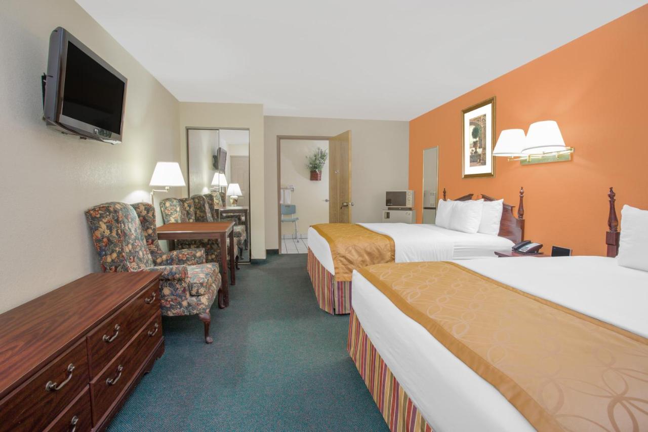 Deluxe Queen Room with Two Queen Beds - Non-Smoking at Days Inn & Suites by Wyndham Red Rock-Gallup