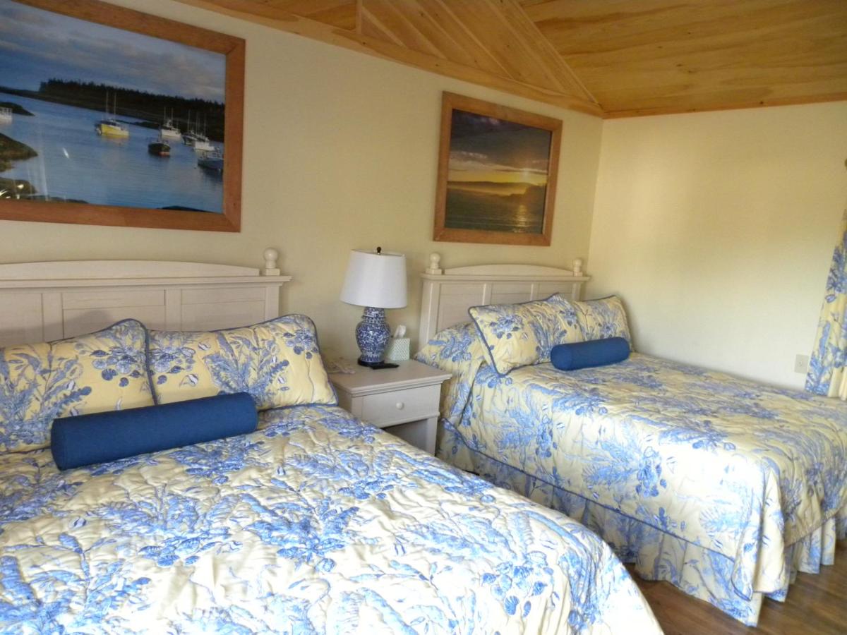 Deluxe One-Bedroom Cottage w/ 2 Queen Beds and Sea View at Colonial Gables Oceanfront Village