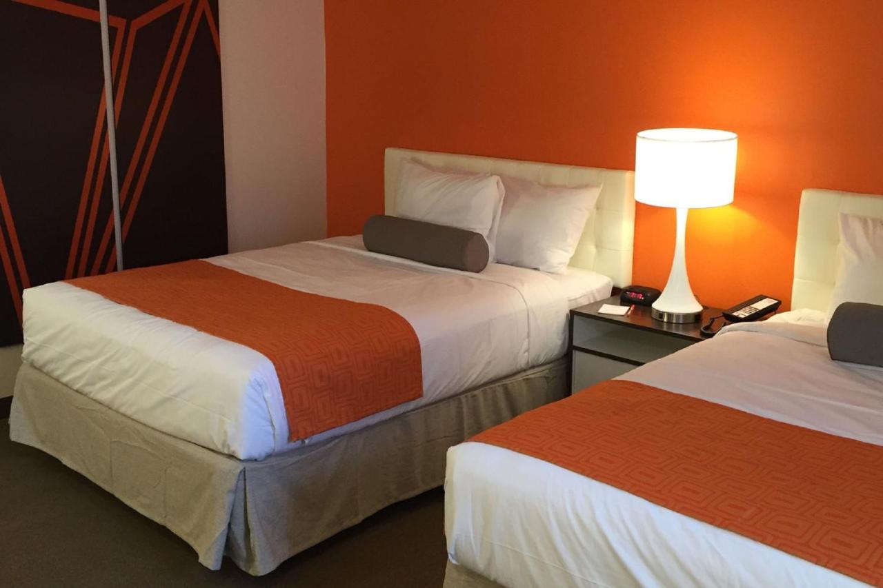 Queen Room with Two Queen Beds - Non-Smoking at Howard Johnson by Wyndham Quincy/Boston