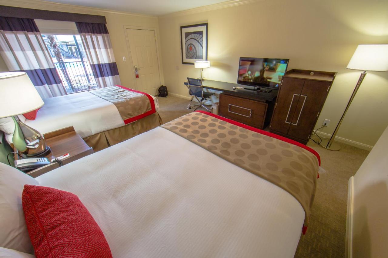 Queen Room - Two Queen Beds Pool View Non Smoking at Ramada by Wyndham Houston Intercontinental Airport East
