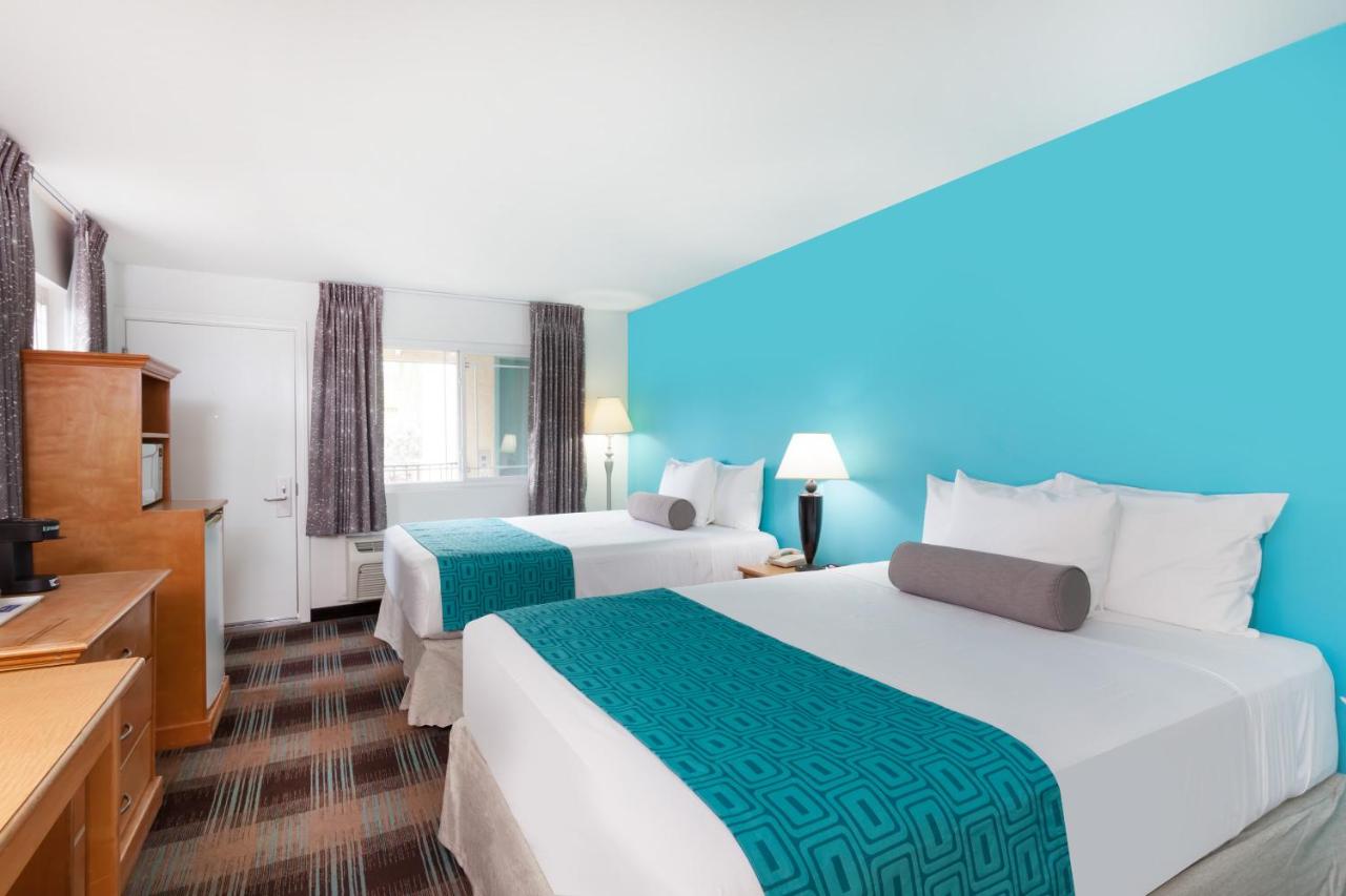 Queen Room with Two Queen Beds at Howard Johnson by Wyndham San Diego Hotel Circle