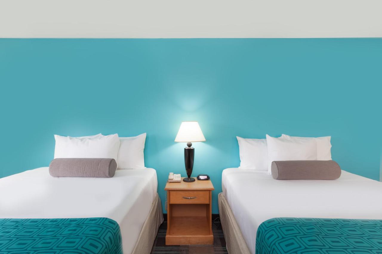 Queen Room with Two Queen Beds at Howard Johnson by Wyndham San Diego Hotel Circle