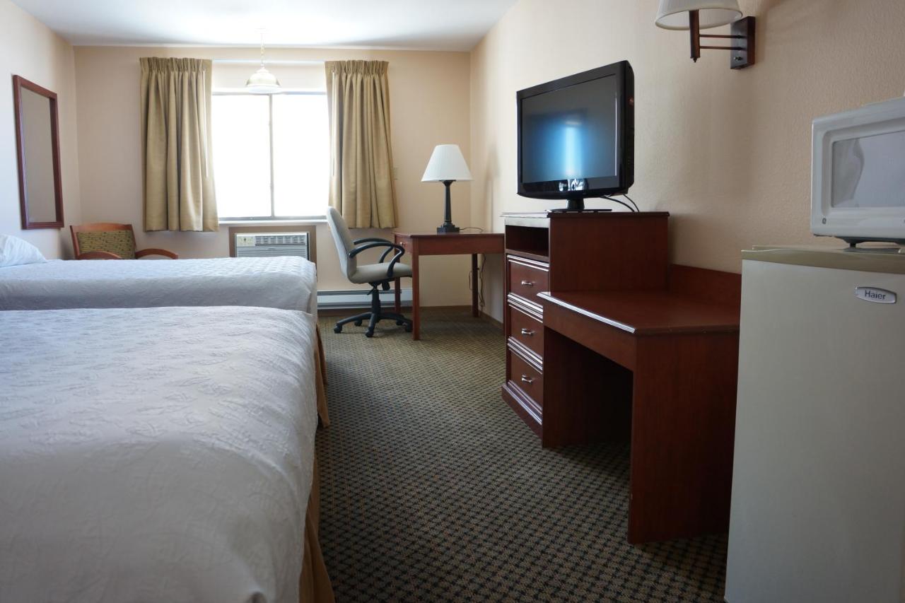 Standard Double Queen Room at Luxury Inn & Suites