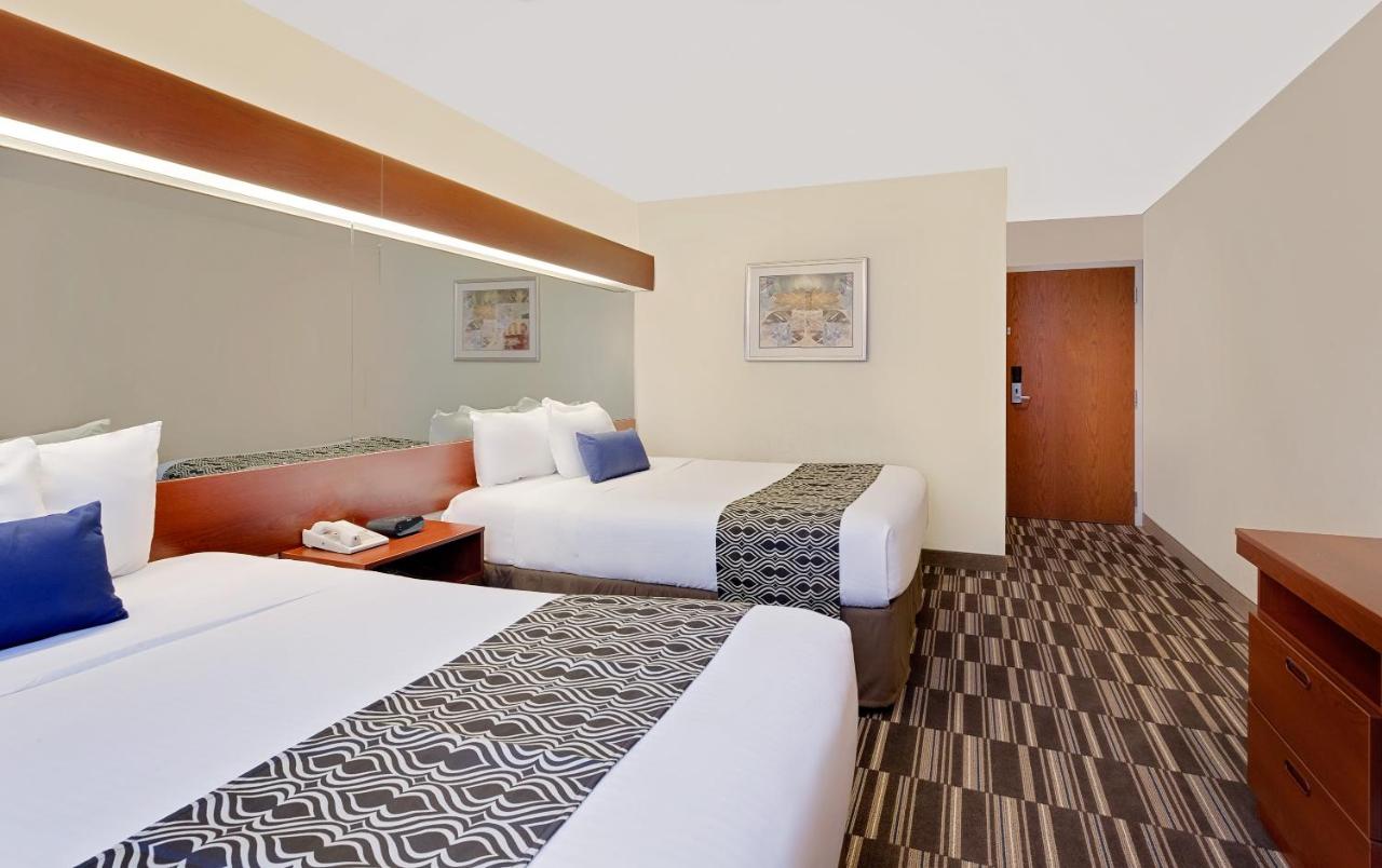 Queen Room with Two Queen Beds - Non-Smoking at Microtel Inn & Suites by Wyndham Middletown