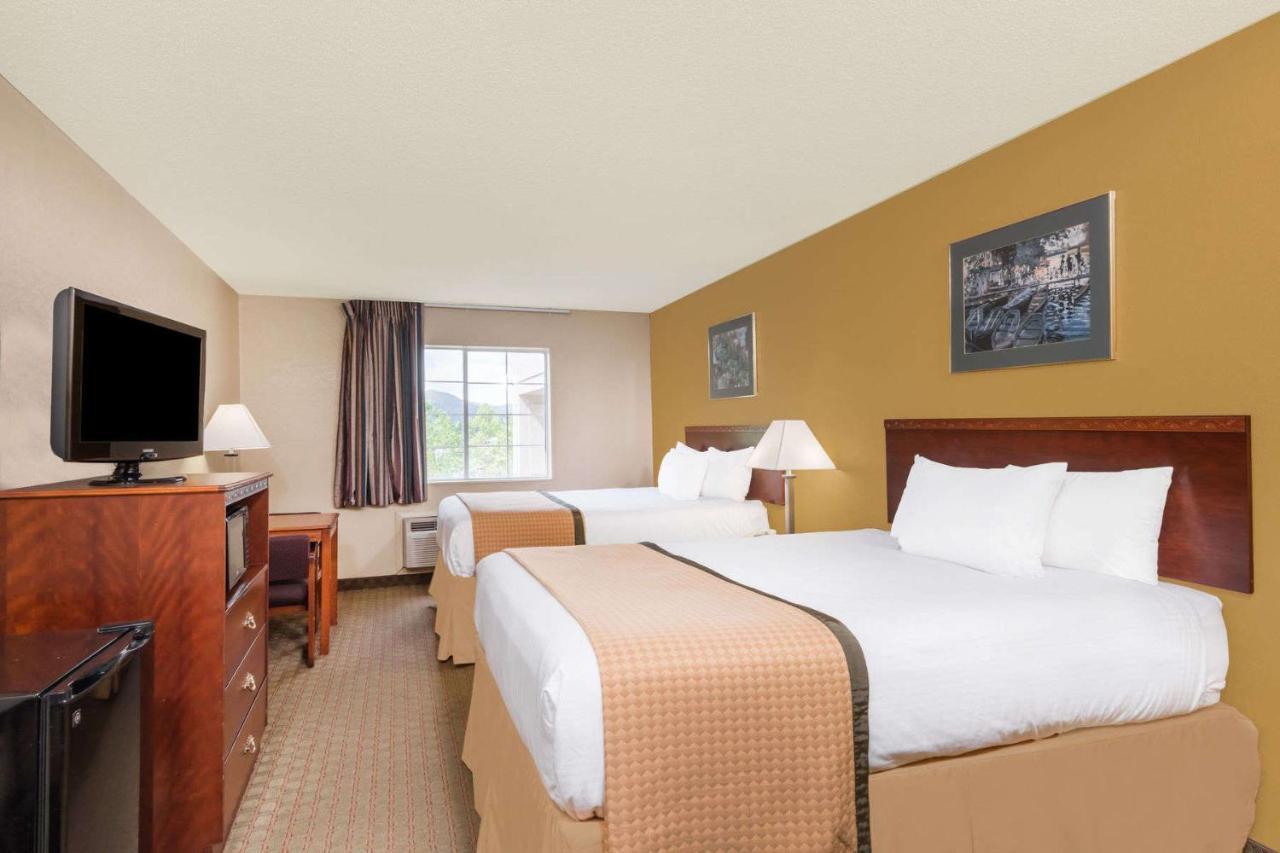 Queen Room with Two Queen Beds - Non-Smoking at Days Inn by Wyndham Norton