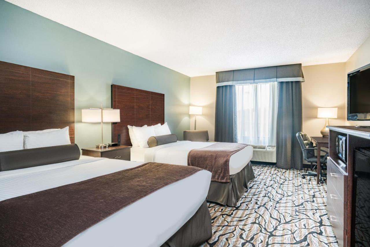 Queen Room with Two Queen Beds - Mobility Access/Non-Smoking at Days Inn & Suites by Wyndham Wausau