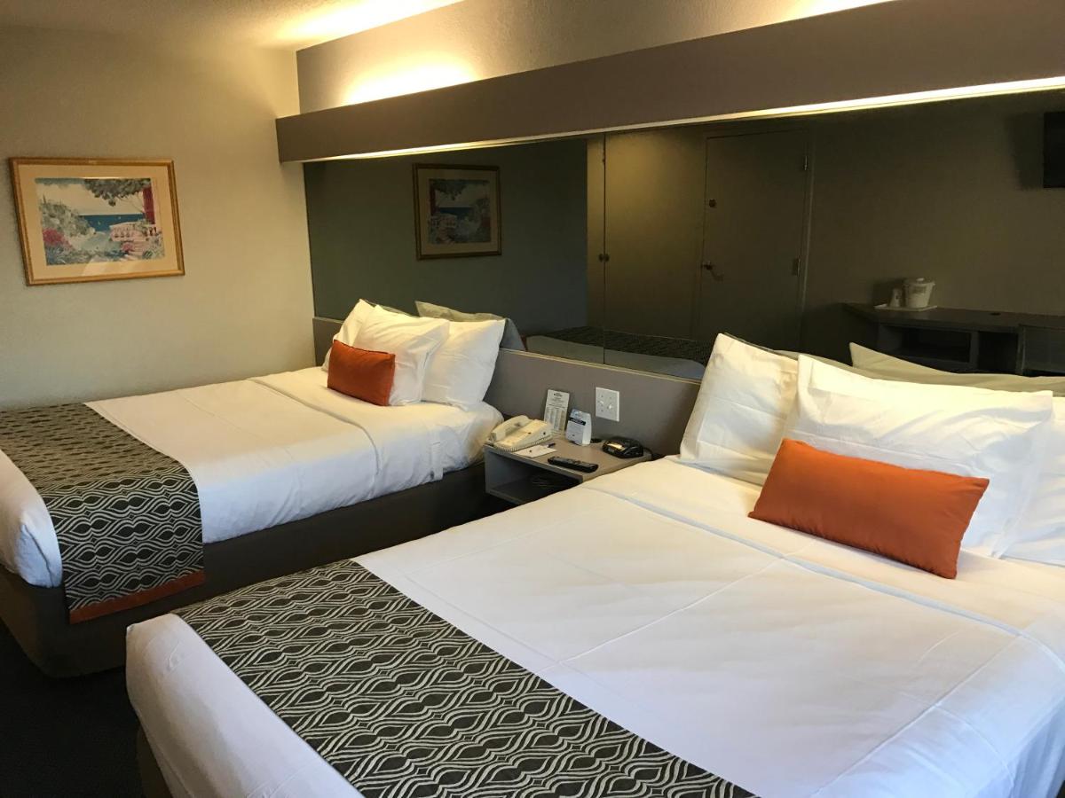 Queen Room with Two Queen Beds - Non-Smoking at Microtel Inn by Wyndham Louisville East