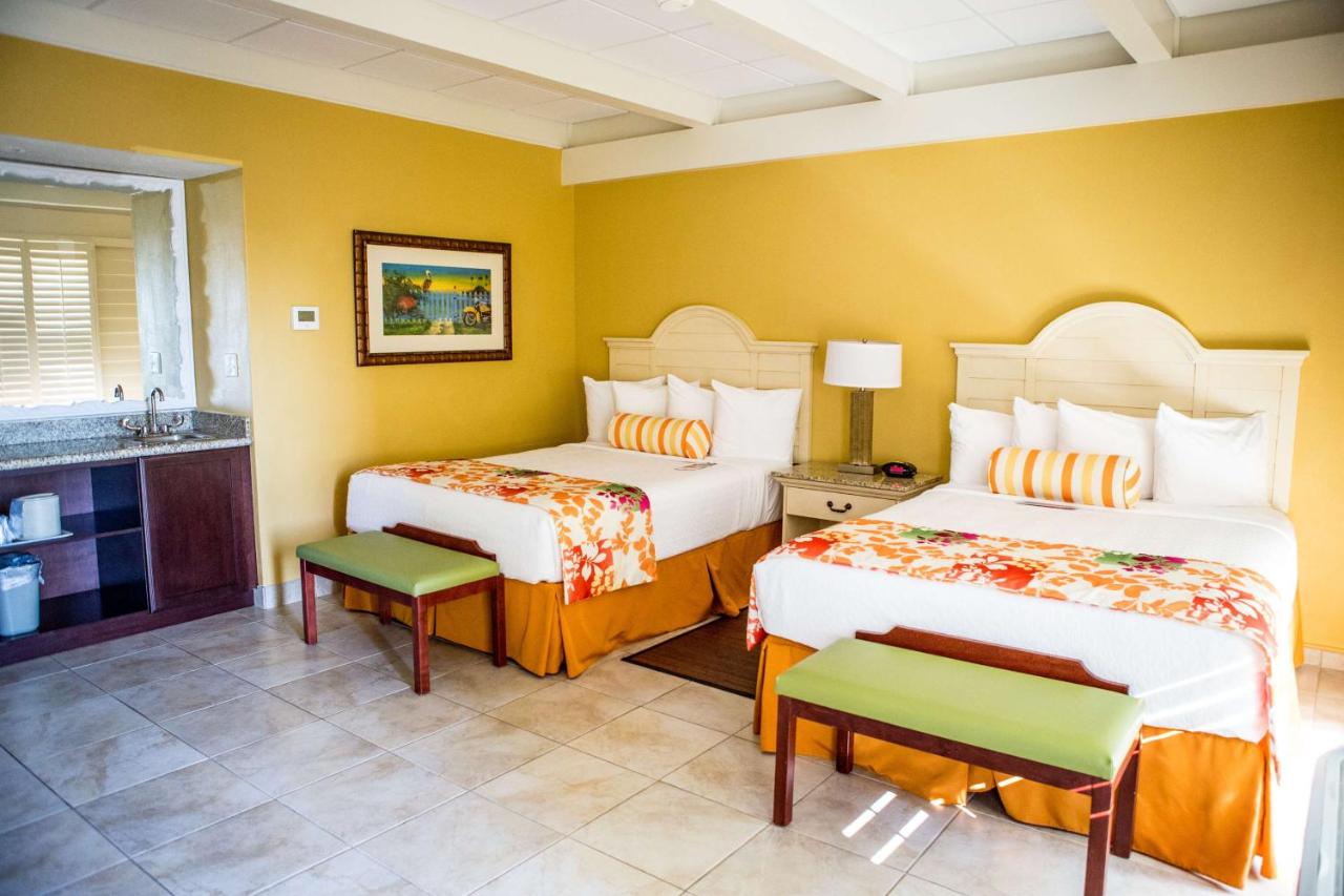Two Queens Suite with Balcony - Bay Side at Best Western Plus Yacht Harbor Inn