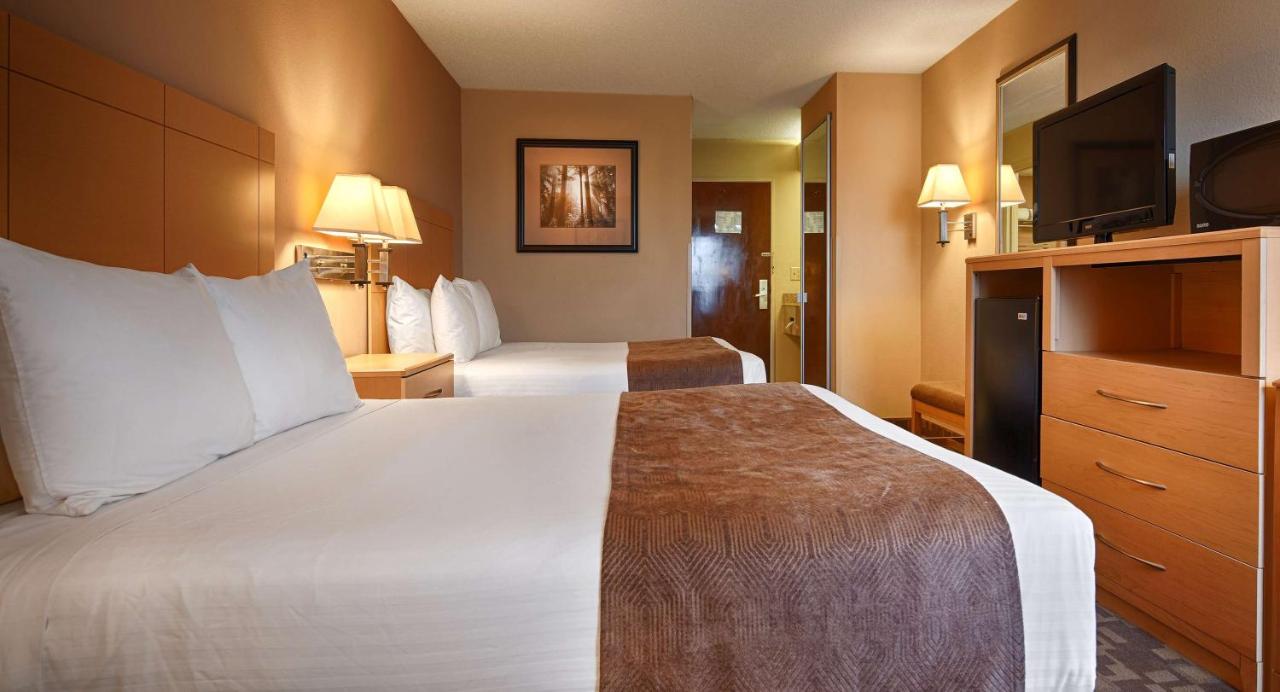 Queen Room with Two Queen Beds- Non-Smoking at SureStay Plus Hotel by Best Western Roanoke Rapids I-95