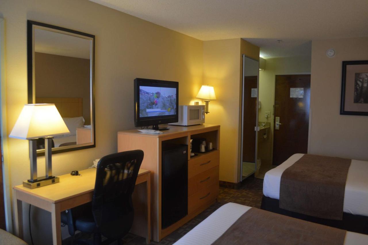 Queen Room with Two Queen Beds- Non-Smoking at SureStay Plus Hotel by Best Western Roanoke Rapids I-95