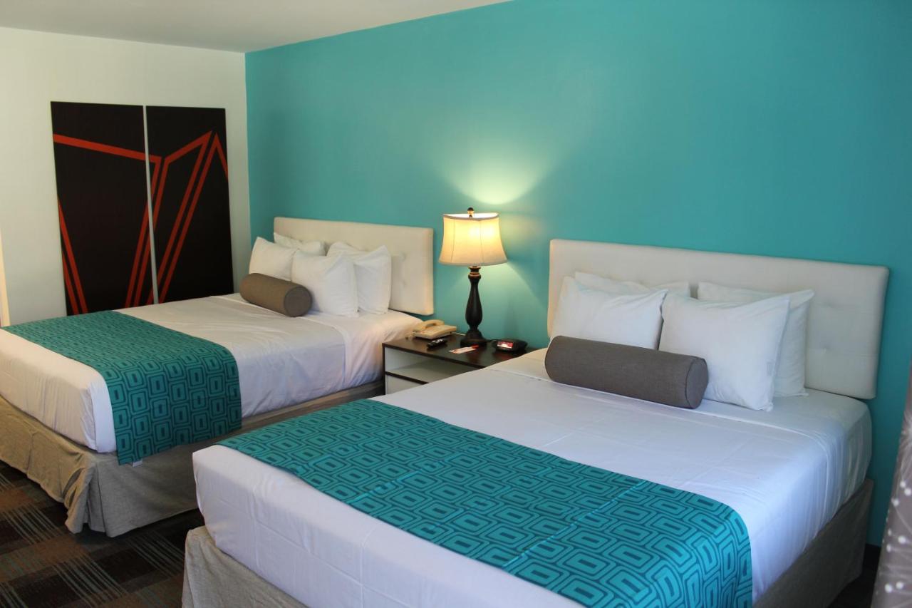 Queen Room with Two Queen Beds at Howard Johnson by Wyndham San Diego Hotel Circle