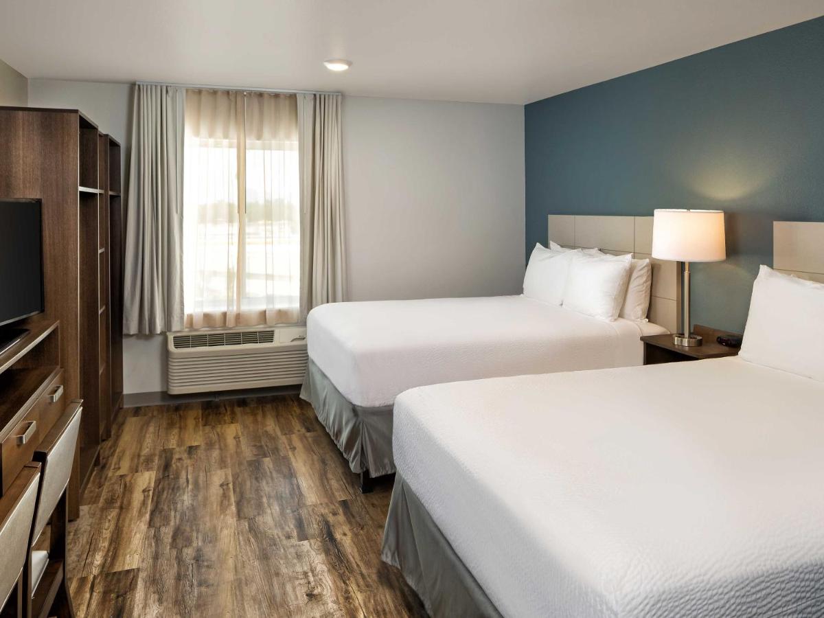 Queen Studio with Two Queen Beds at WoodSpring Suites Houston IAH Airport