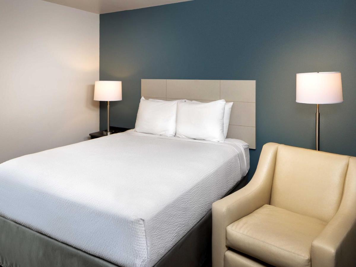 Queen Studio at WoodSpring Suites Houston IAH Airport