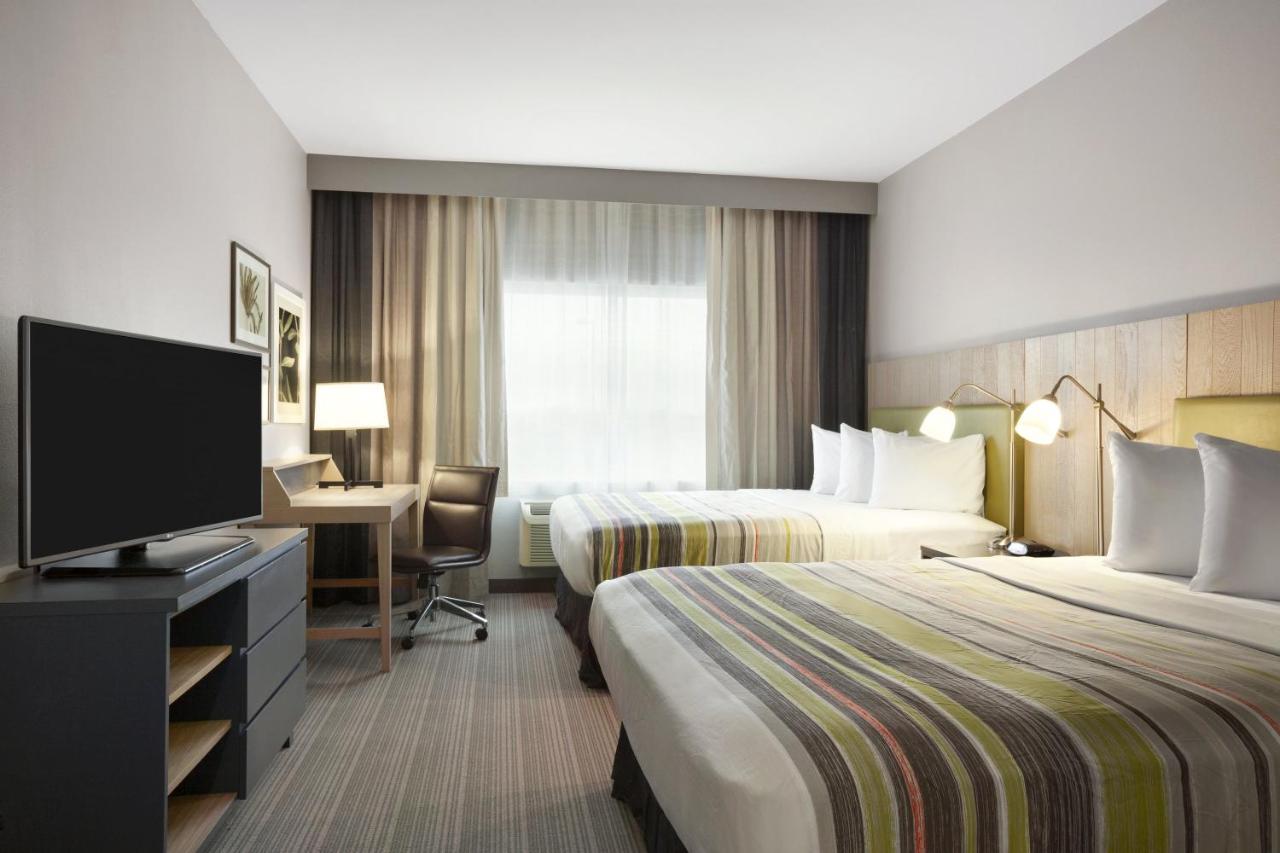 Queen Room with Two Queen Beds - Non-Smoking at Country Inn & Suites by Radisson, Indianola, IA