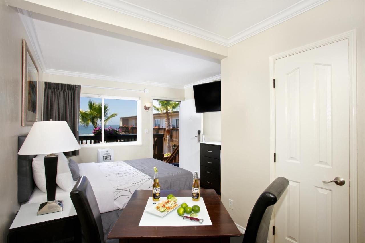 Queen Room with Partial Ocean View at Ocean Beach Hotel