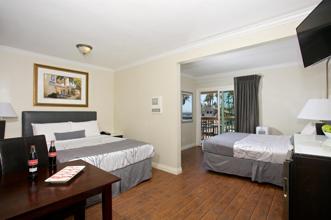 Quadruple Room with Balcony at Ocean Beach Hotel