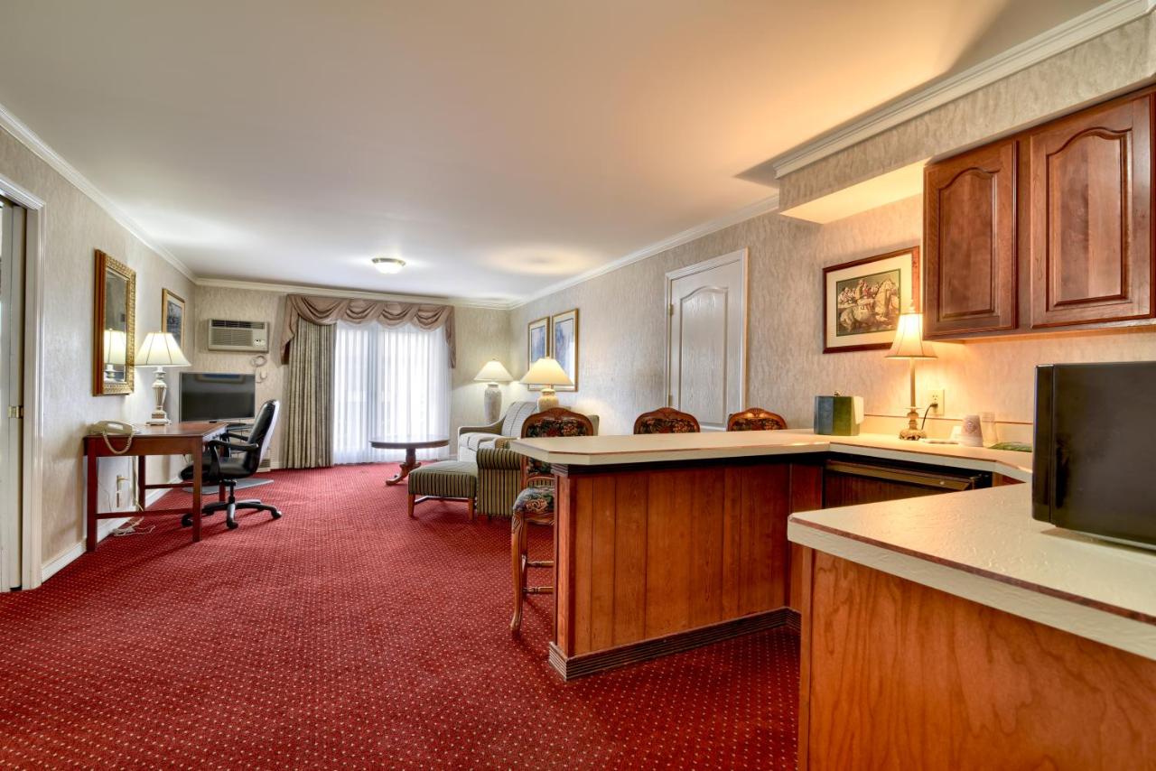 Executive Suite with Balcony at Roosevelt Inn and Suites Saratoga Springs