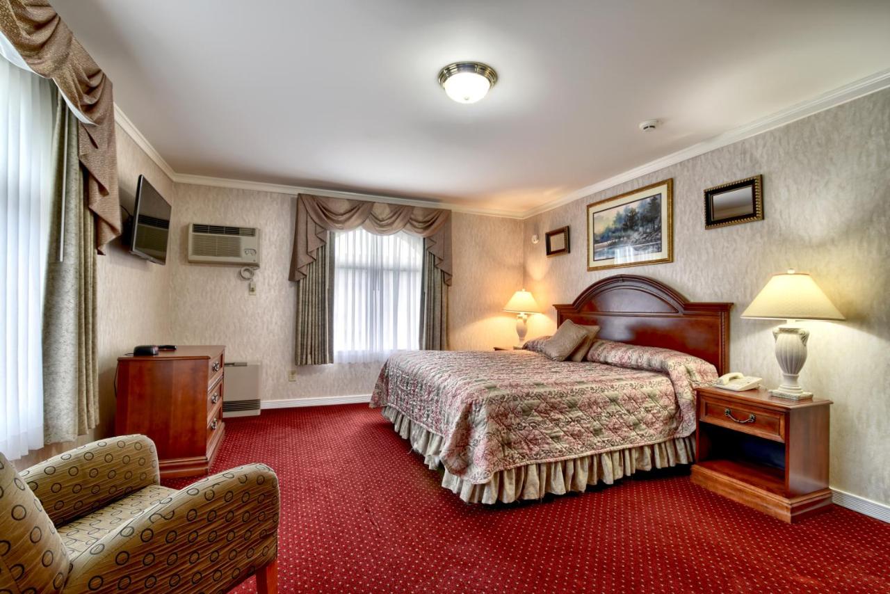 Executive Suite with Balcony at Roosevelt Inn and Suites Saratoga Springs