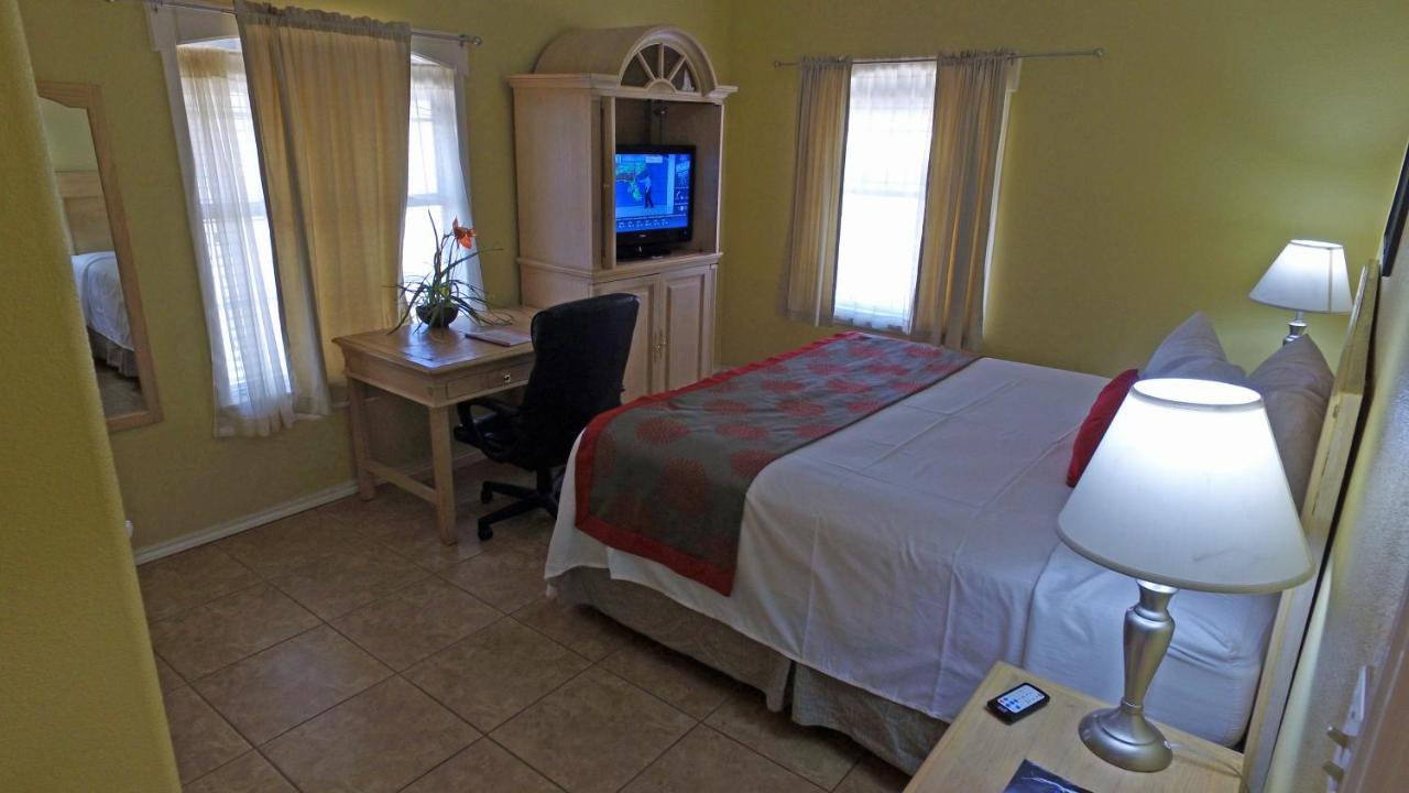 Superior Queen Room with Three Queen Beds - Non-Smoking at Ramada by Wyndham & Suites South Padre Island