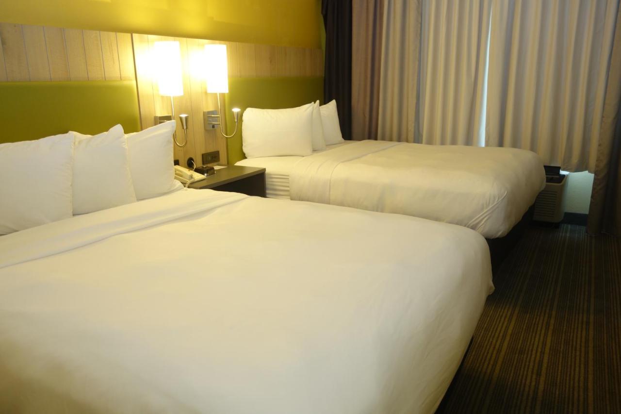 One-Bedroom Suite with Two Queen Beds and Sofa Bed - Non-Smoking at Country Inn & Suites by Radisson, Burlington (Elon), NC