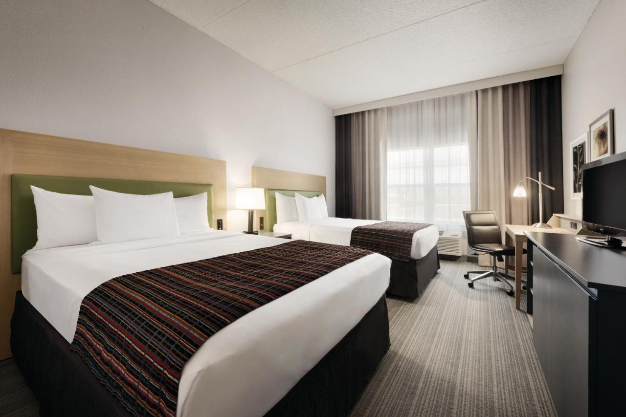 Queen Room with Two Queen Beds - Disability Access/Non-Smoking, Non-Pet Friendly at Country Inn & Suites by Radisson, Coralville, IA