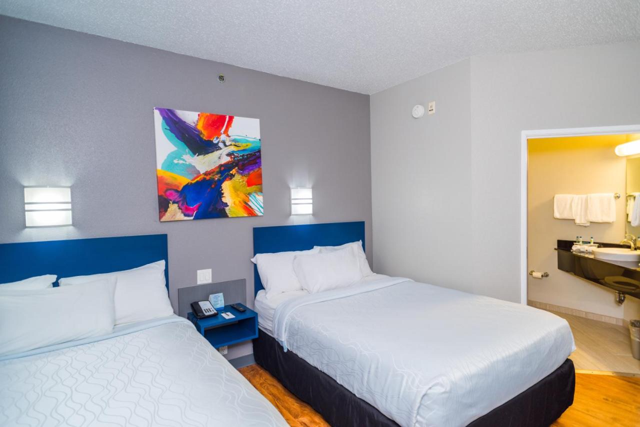 Standard Queen Room with Two Queen Beds - Non Smoking at Studio Z, an Ascend Collection Hotel