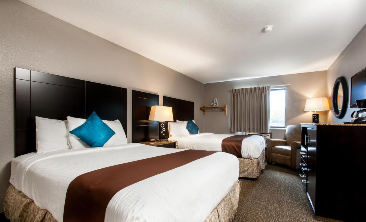 Queen Room with Two Queen Beds at Heartland Inn