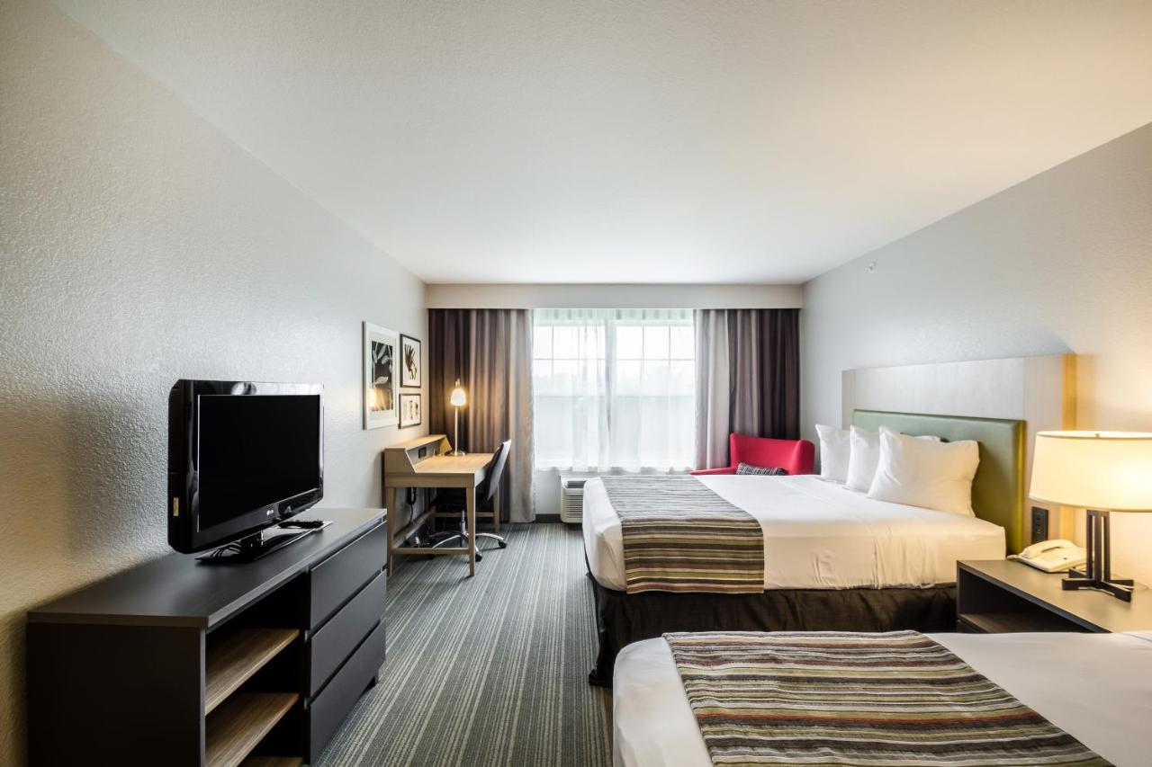 Queen Room with Two Queen Beds - Disability Access at Country Inn & Suites by Radisson, Fond du Lac, WI