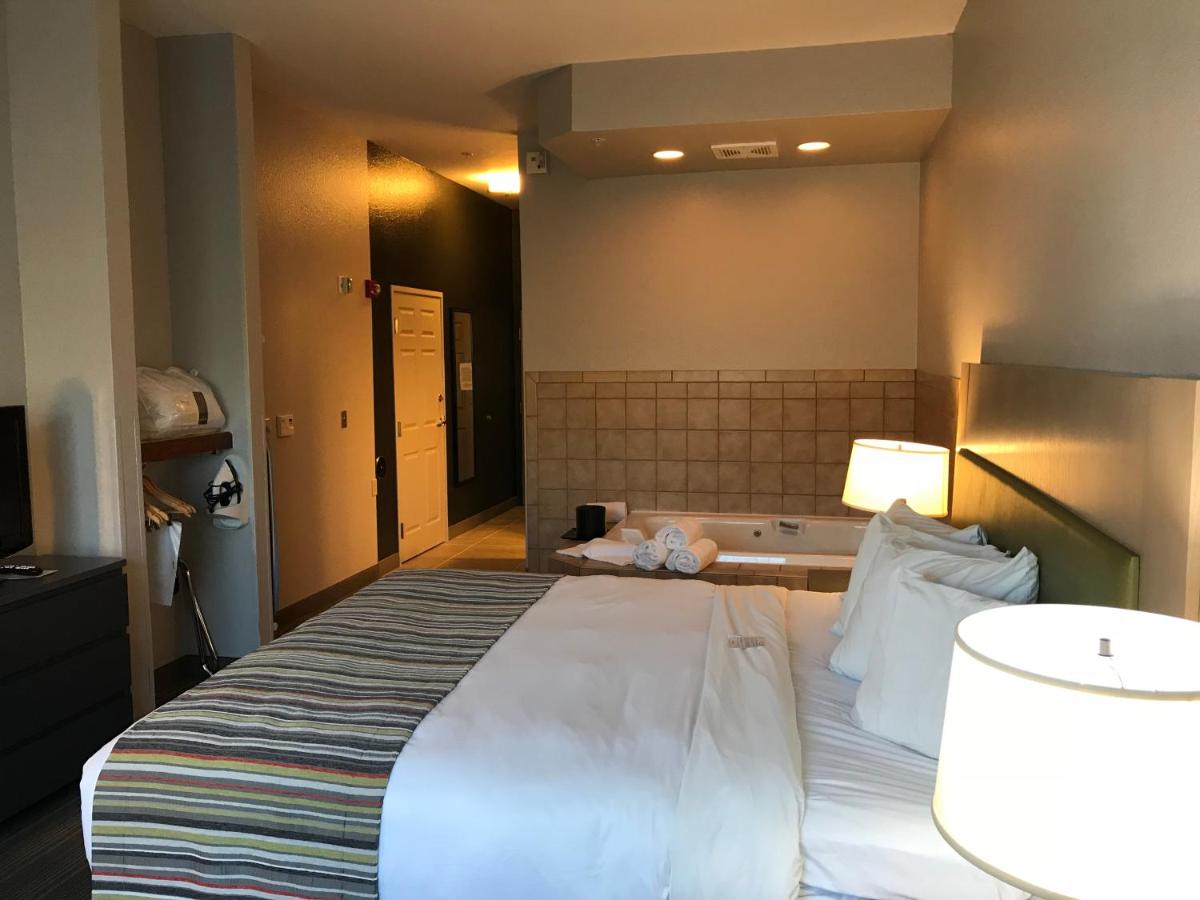King Suite with Spa Bath - Disability Access at Country Inn & Suites by Radisson, Fond du Lac, WI