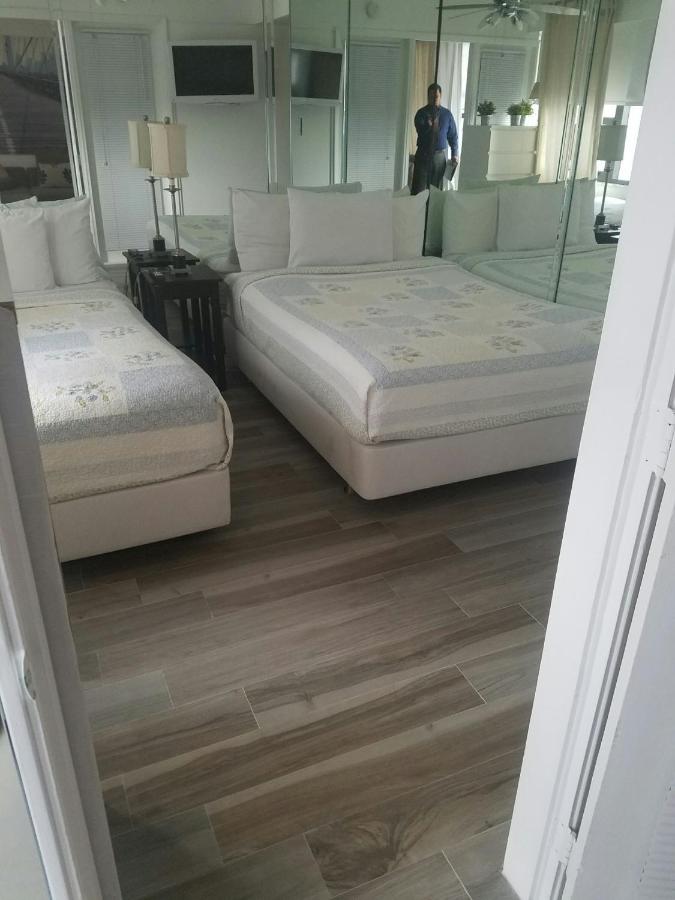 Signature Two-Bedroom 1 King + 2 Twin Beds at Alexander by Design Suites