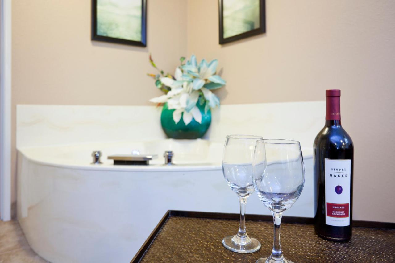 King Suite with Spa Bath at GrandStay Residential Suites - Eau Claire