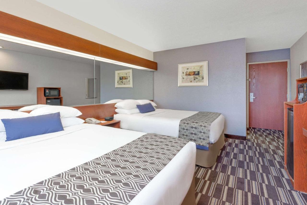 Queen Room with Two Queen Beds - Non-Smoking at Microtel Inn & Suites by Wyndham Bremen