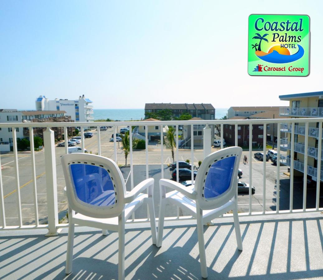 Partial Ocean View 2 Queens & Sofa - No Pets Allowed at Coastal Palms Inn & Suites