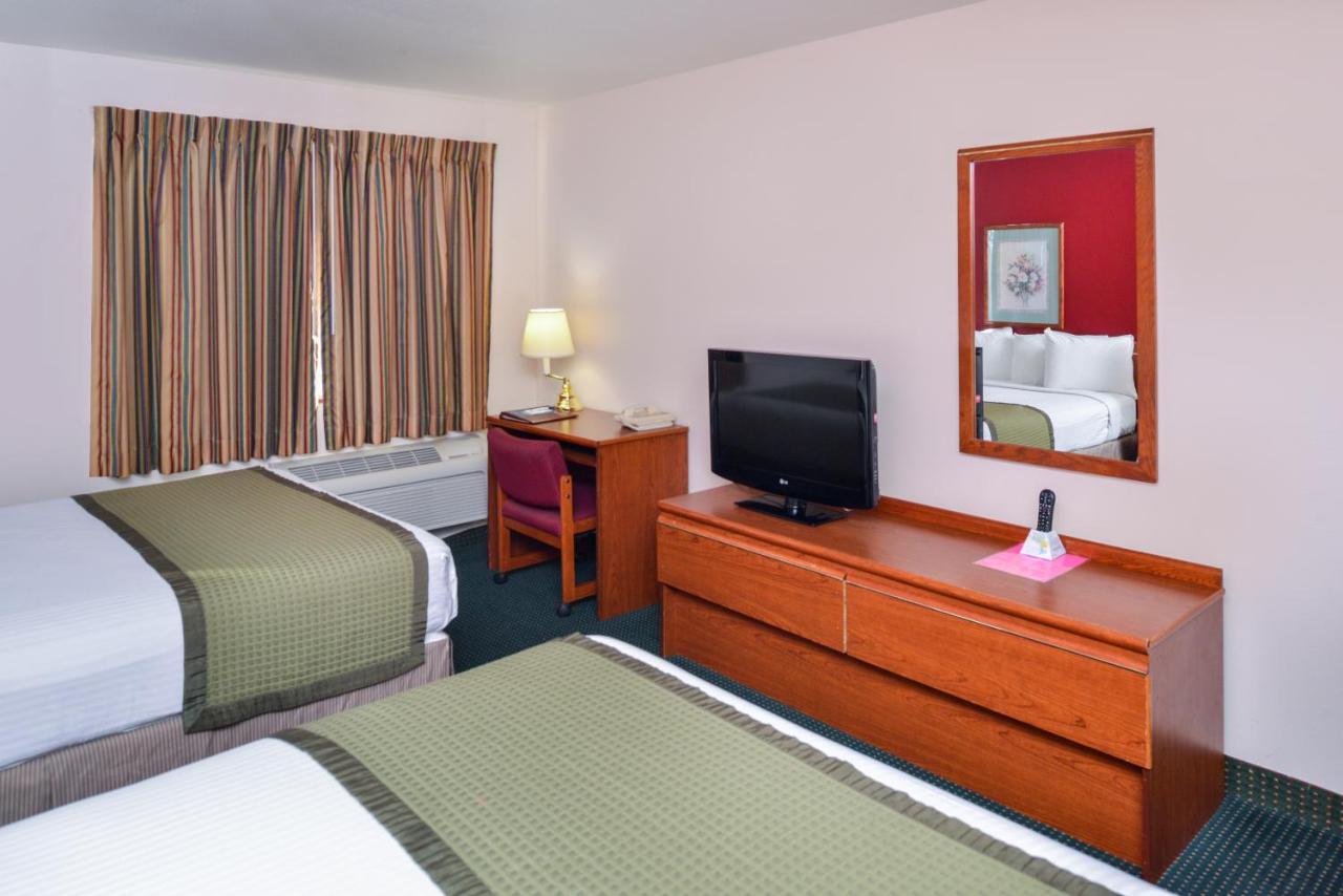 Queen Room with Two Queen Beds - Pet Friendly at Travelodge Suites by Wyndham Newberg