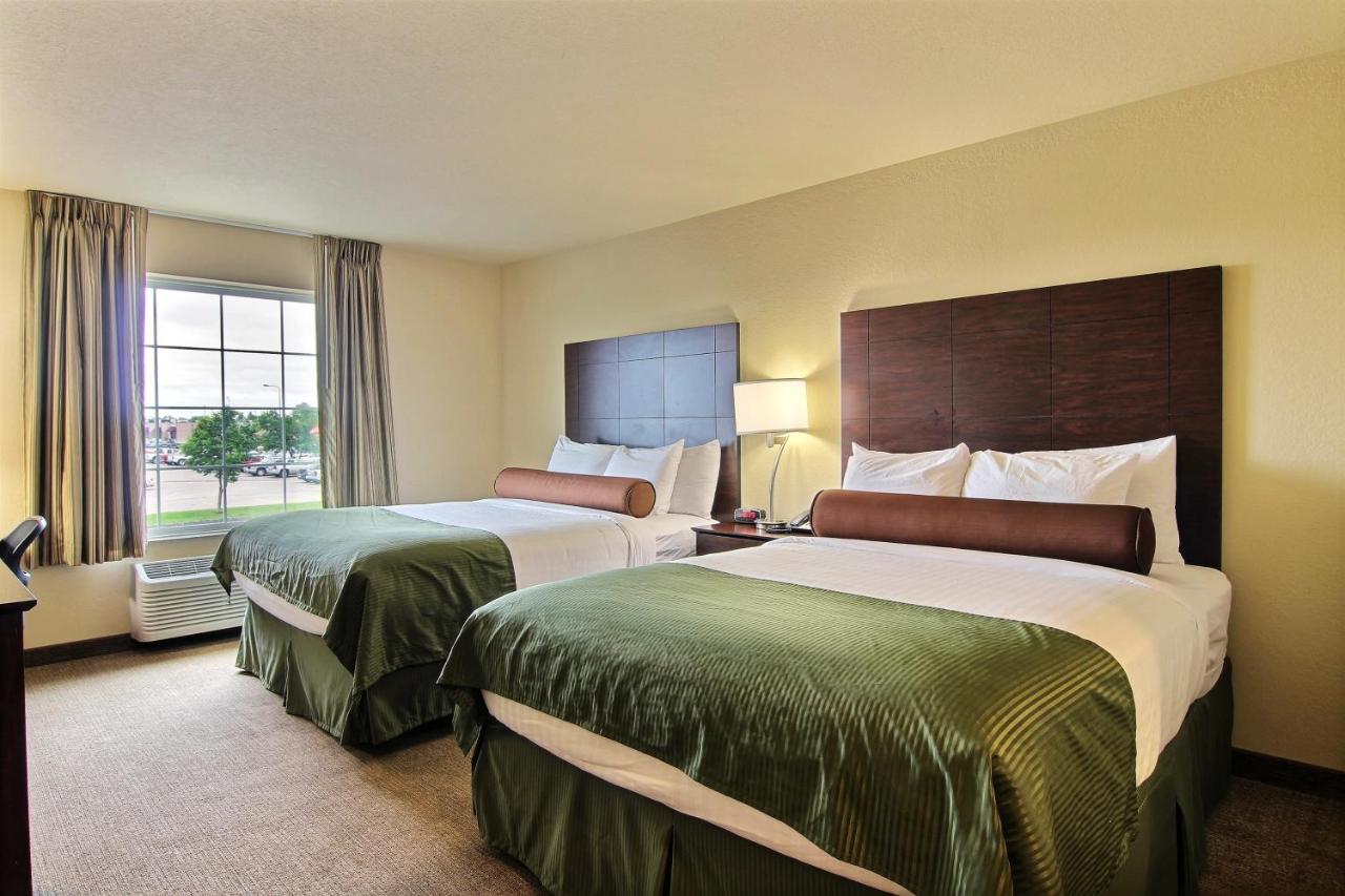 Queen Room with Two Queen Beds at AmeriVu Inn and Suites