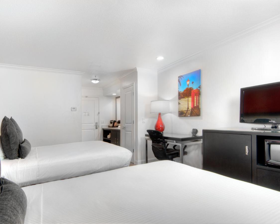Queen Room with Two Queen Beds at Aggie Inn, an Ascend Collection Hotel